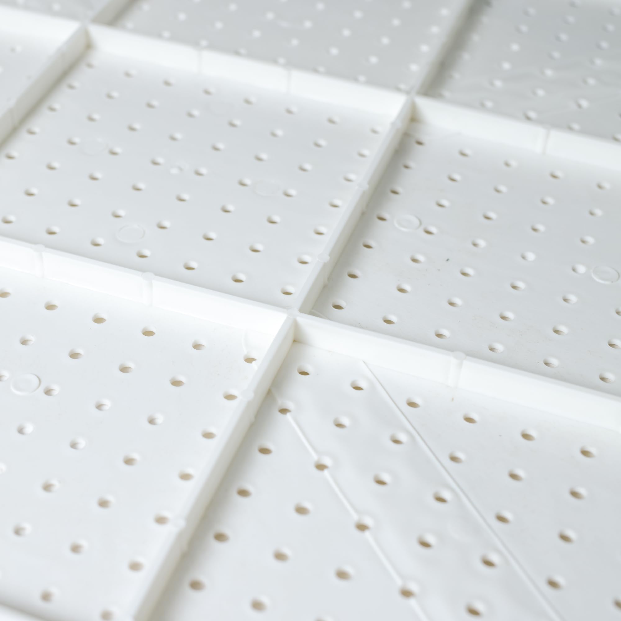WallPeg pegboard features 12 flush mounting holes