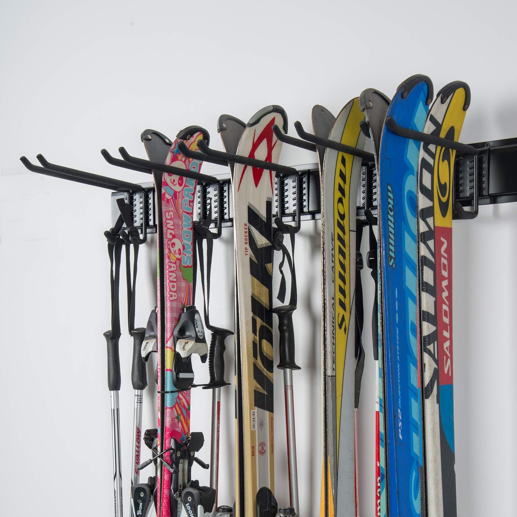 WALMANN Ski Wall Rack adjustable spacing adapts to varying ski and pole setups.