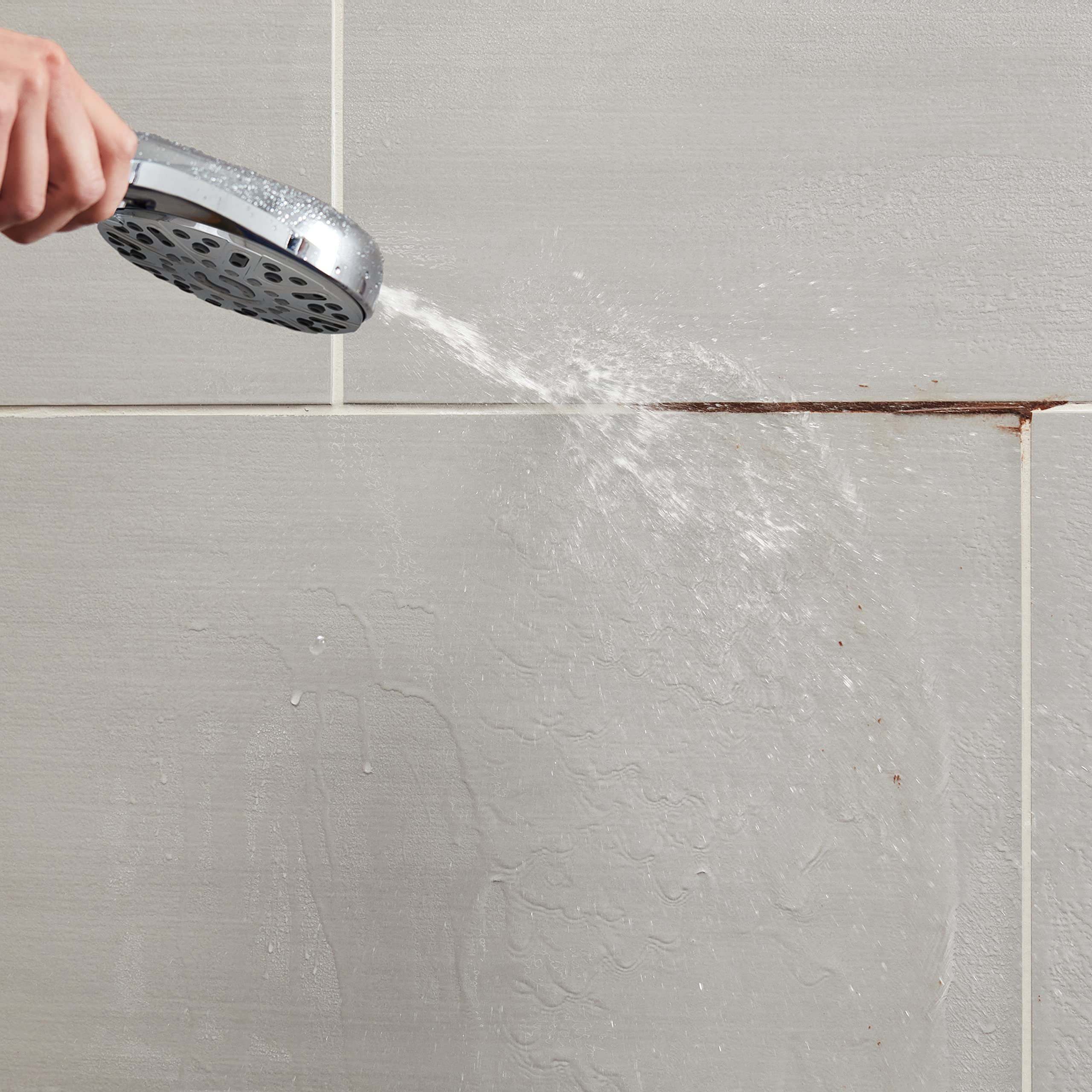 PowerJet action from Waterpik ShowerClean Pro delivers a targeted high-pressure rinse.