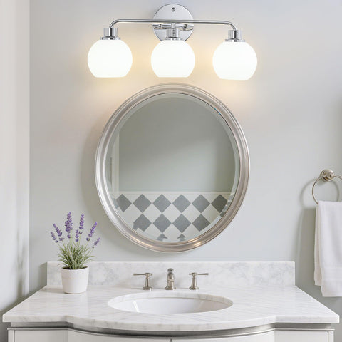 Watyo three-light silver vanity light brightens bathrooms and hallways.