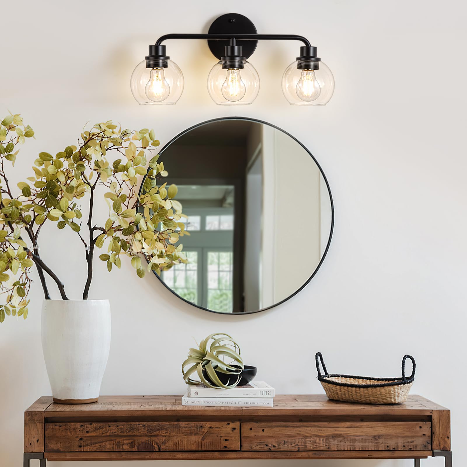 Watyo globe clear glass shades provide crisp, inviting bathroom glow