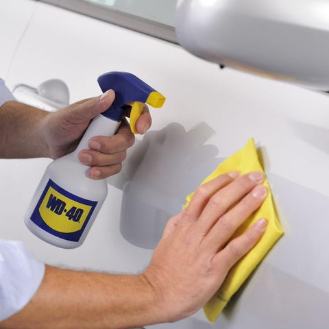 WD-40 Spray Applicator with hand sprayer for even coating on tools and parts.