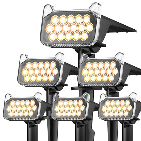 WdtPro solar spot light outdoor bright beam illuminates trees and pathways