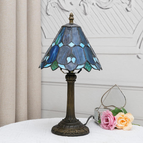 Wecrejoni living room Tiffany lamp creates a refined focal point.