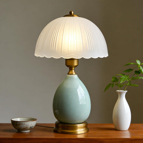 WELAISA vintage green glass table lamp on a bedside table provides warm reading light