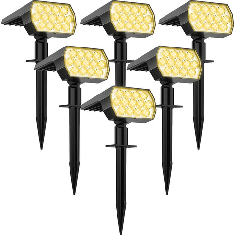 WELALO solar spot lights outdoor highlight a tree for curb appeal and nighttime security.