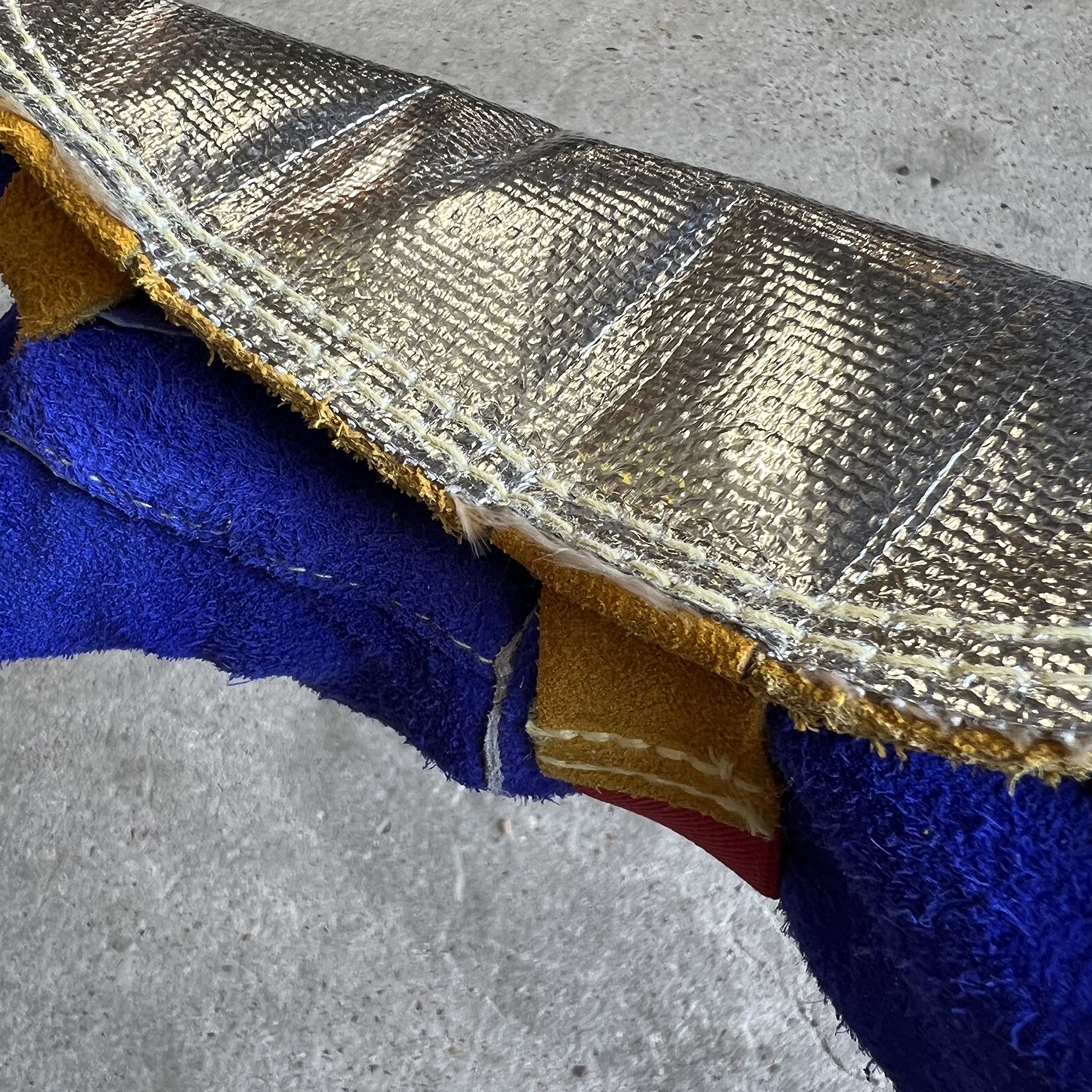 Fiberglass layer supports high spatter welding for durable protection