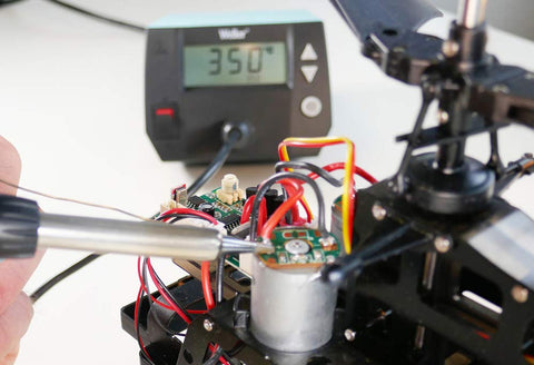 Weller WE1010EDU kit contents highlighting lead-free solder and ET tips for safe learning.