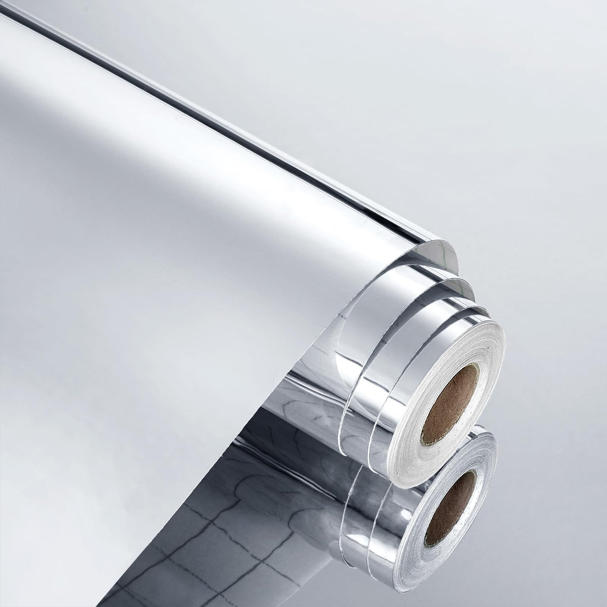 WESTICK mirror sticker on wall enhances light and perceived space.