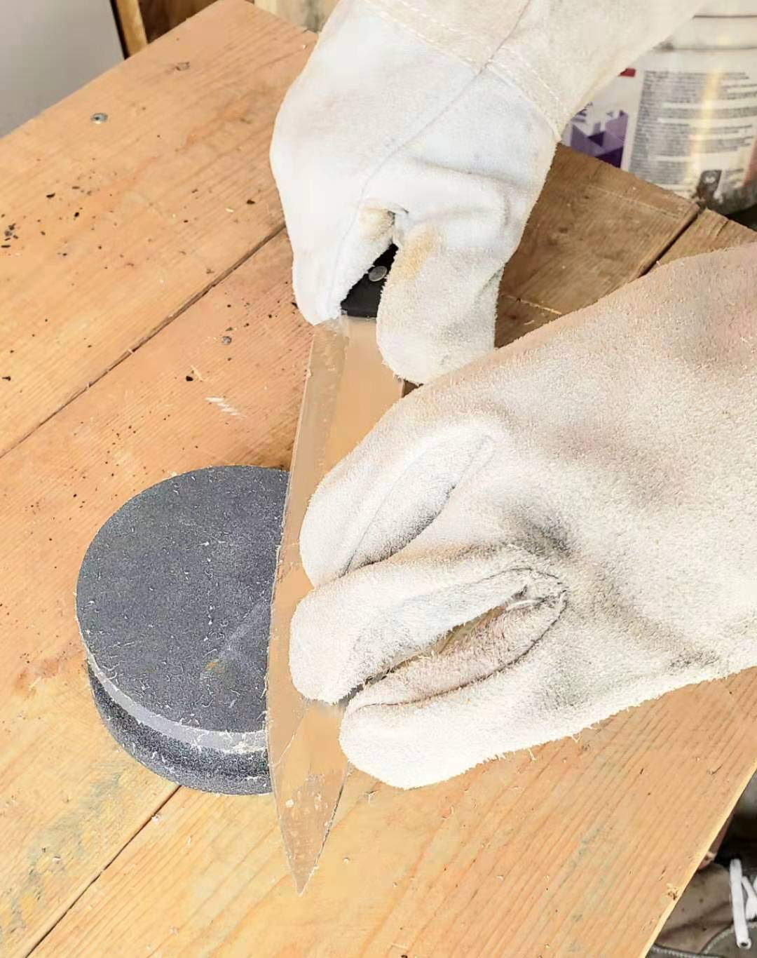 Whitby Abrasives shovel sharpener in use, clean edge ready for use.