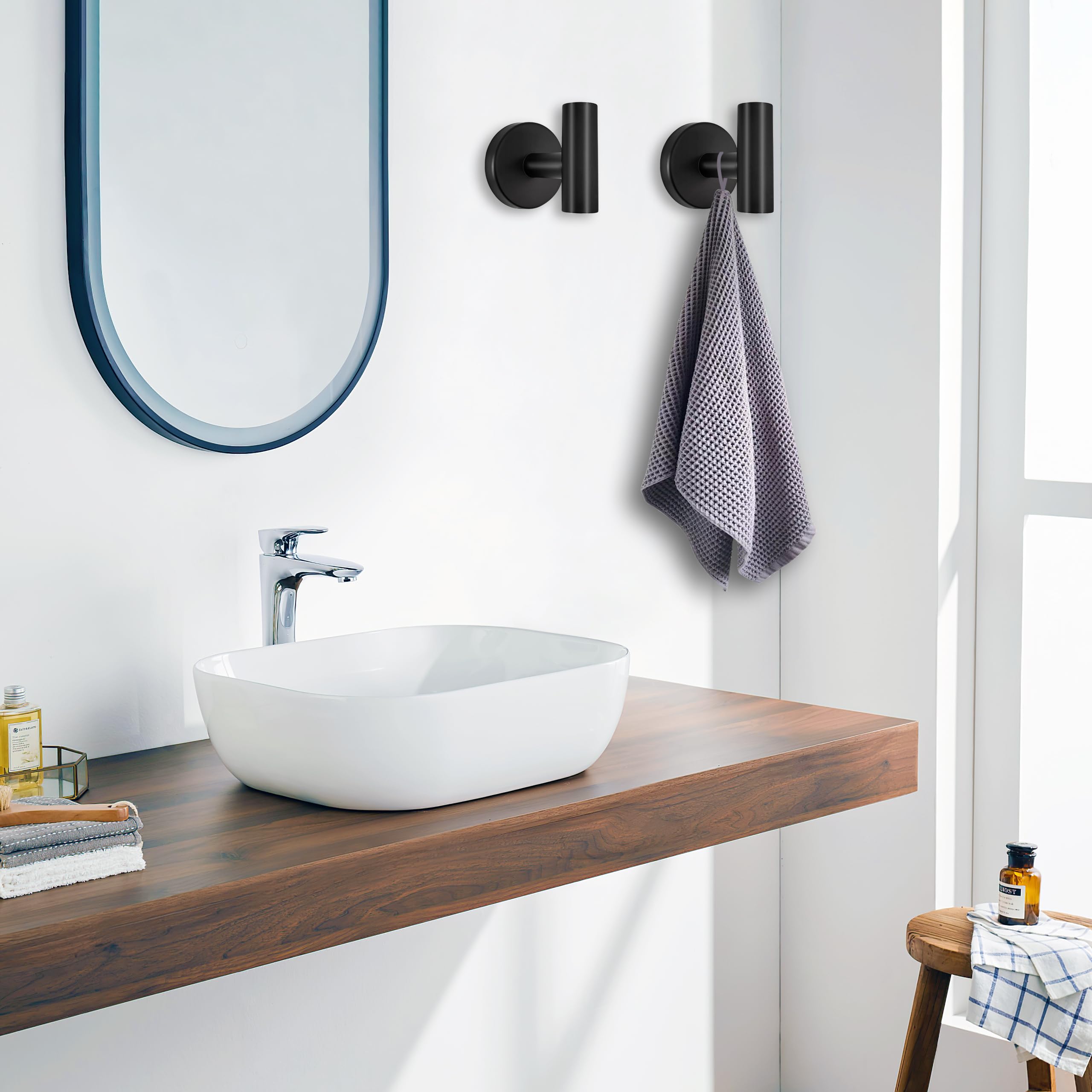 Two Wisexin hooks support robes and coats with strong wobble free grip