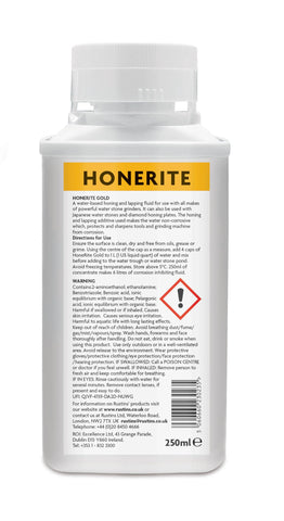 Close-up of HoneRite Gold label on the bottle highlighting rust prevention and eco-friendly formula.