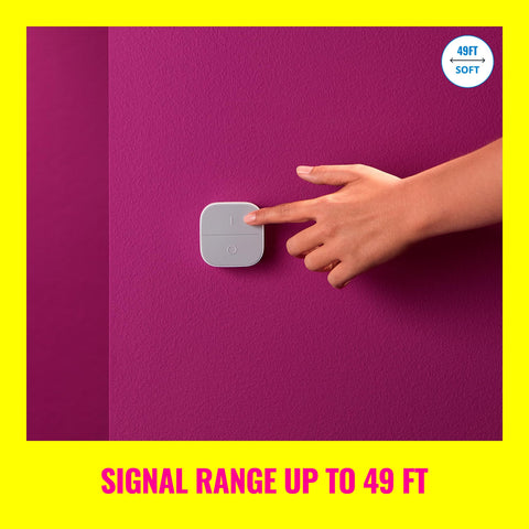 WiZ Connected portable button mounted on wall for screwless setup