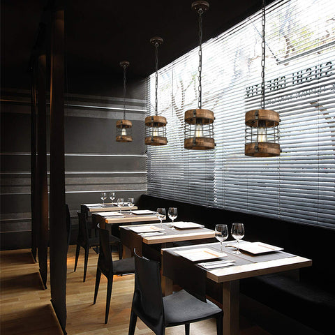 wochos industrial cage pendant shown above kitchen island setting