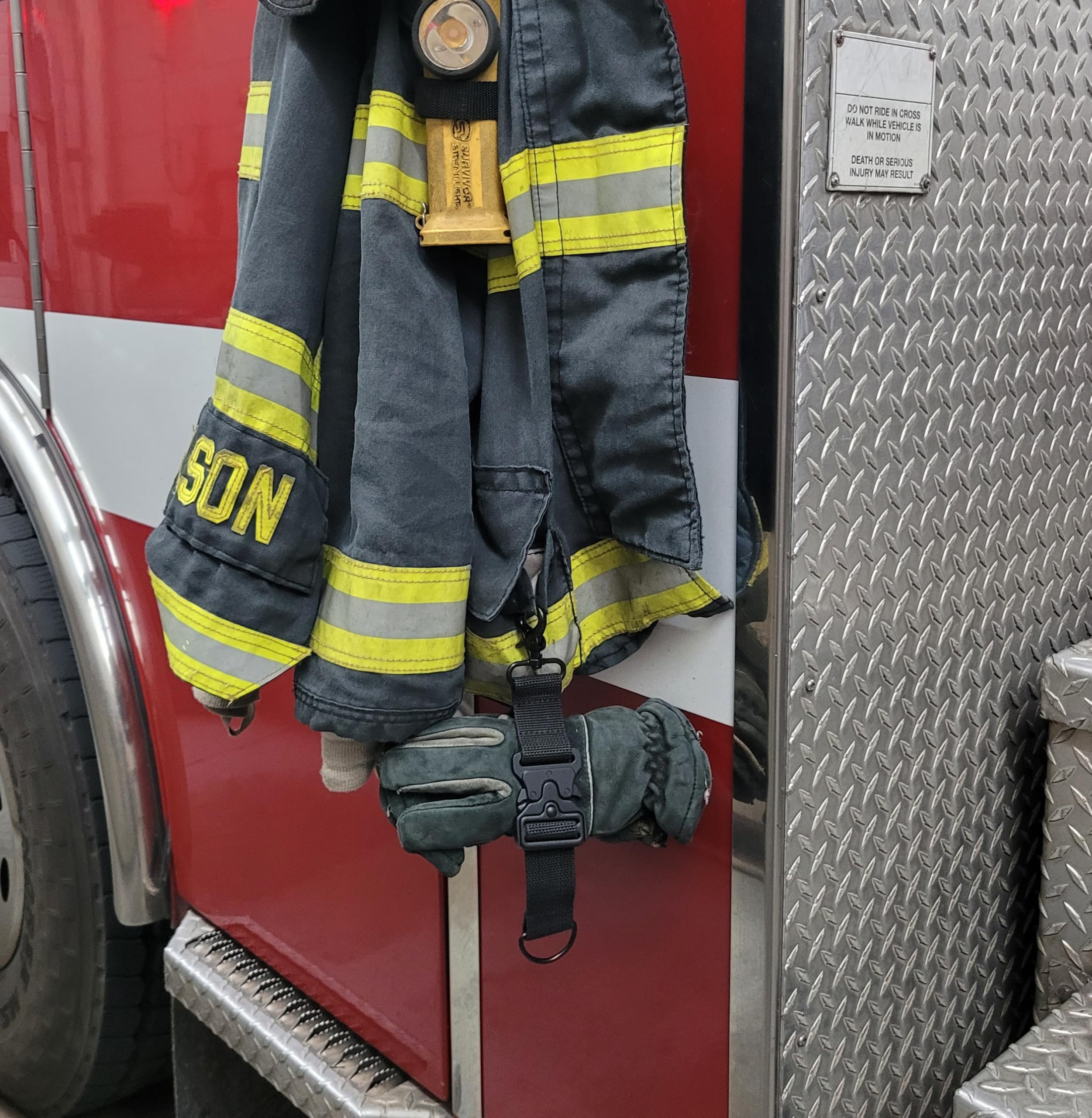 WorkingFire glove strap holds bulky gloves securely for firefighting, welding, or construction tasks.