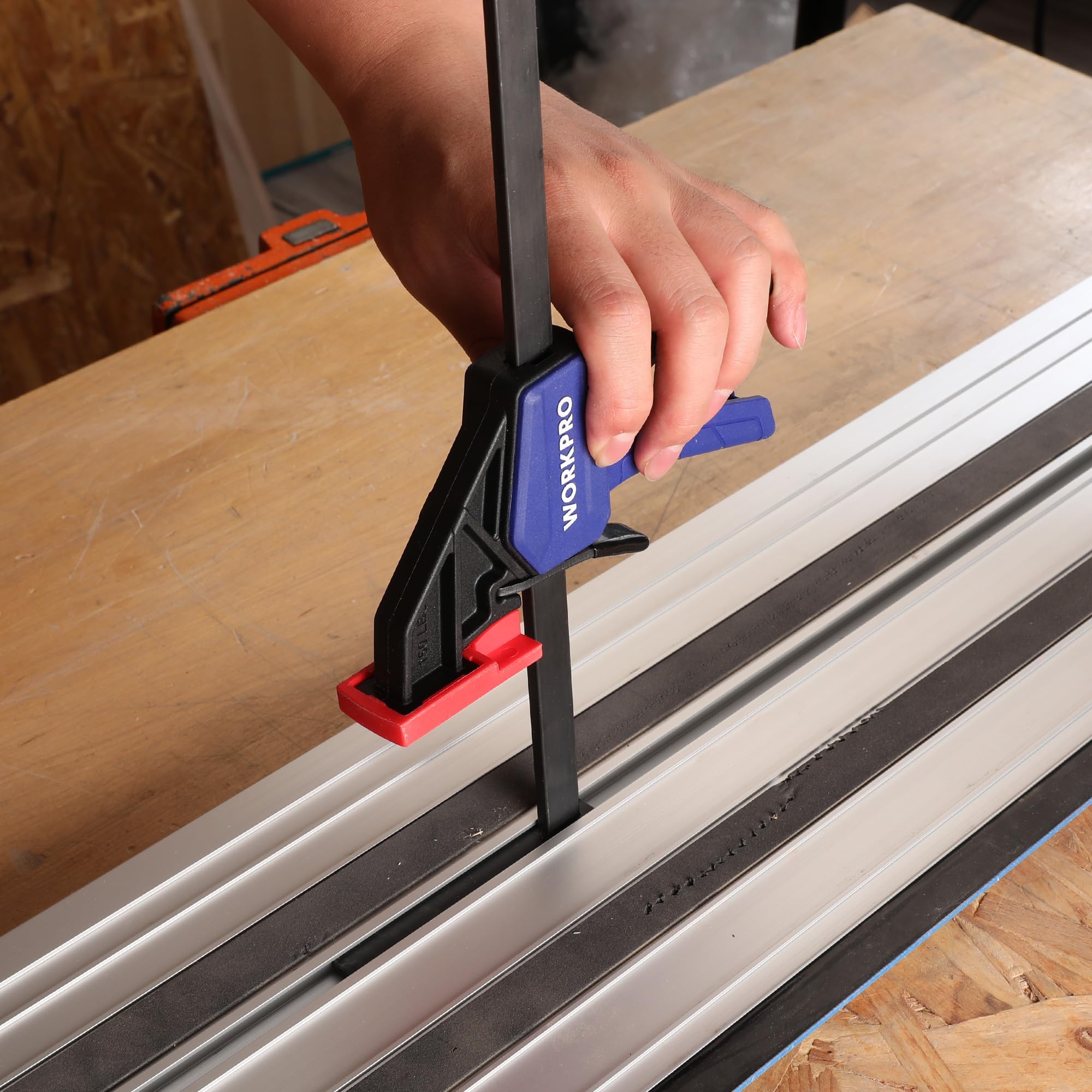 WORKPRO track saw clamp in action during a straight cut.