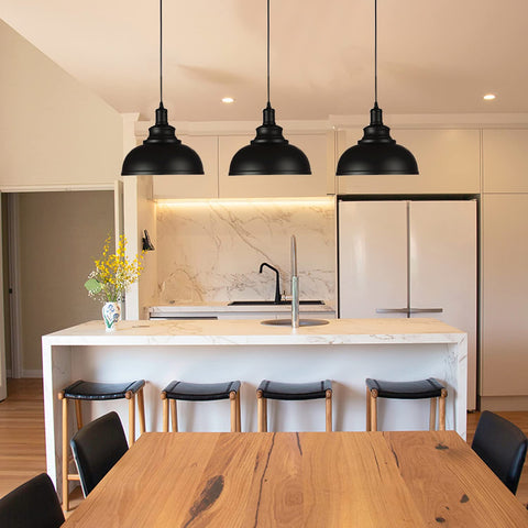 Wudor Black Dome pendant light illuminating a modern dining nook with farmhouse charm.