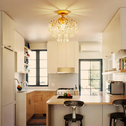 WUZUPS staircase area shines with glamorous gold chandelier focal point
