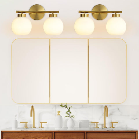Wynterhaven vanity light with milky globe shades provides a soft, inviting glow.