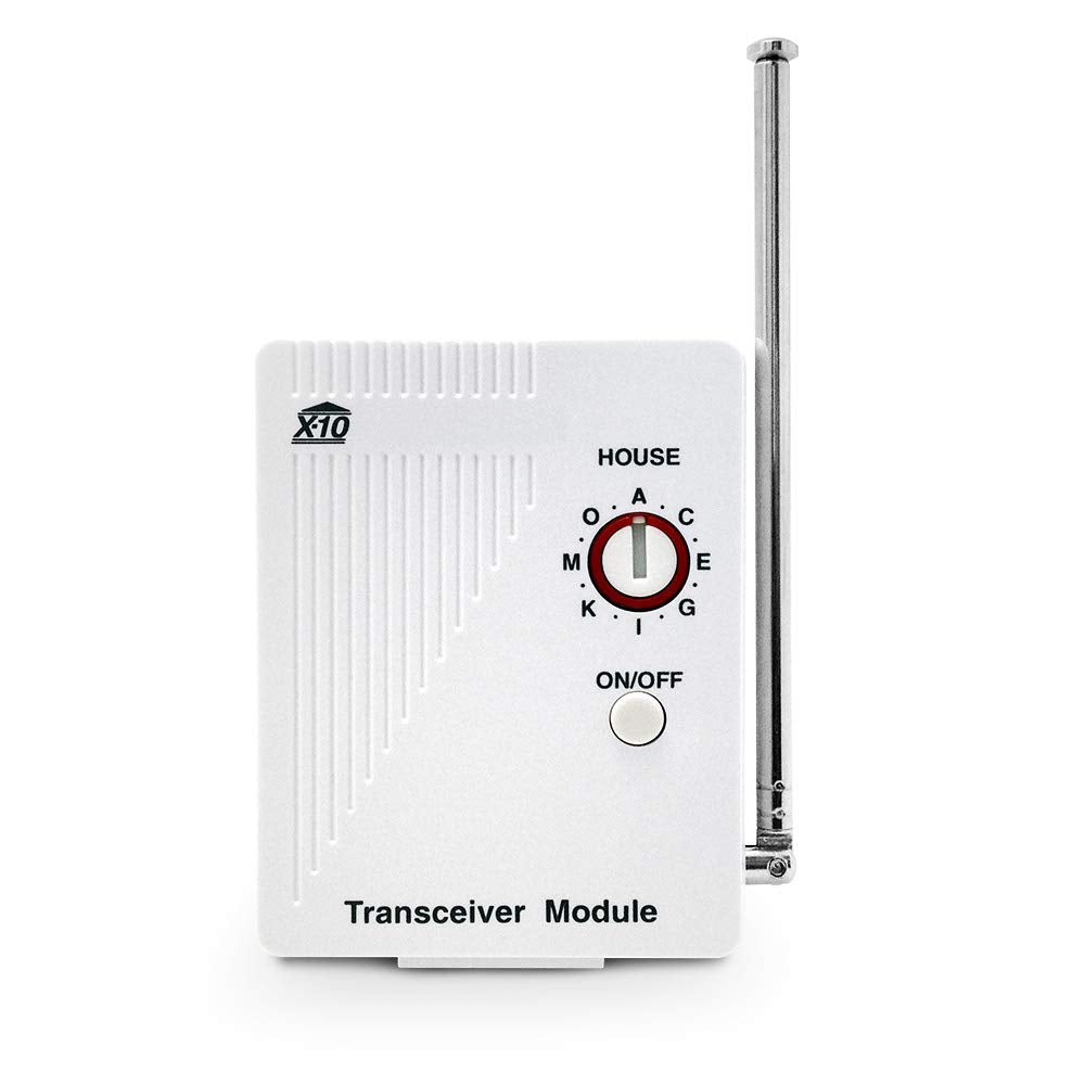 X10 TM751 wireless transceiver plugged into wall socket enabling remote lamp control.