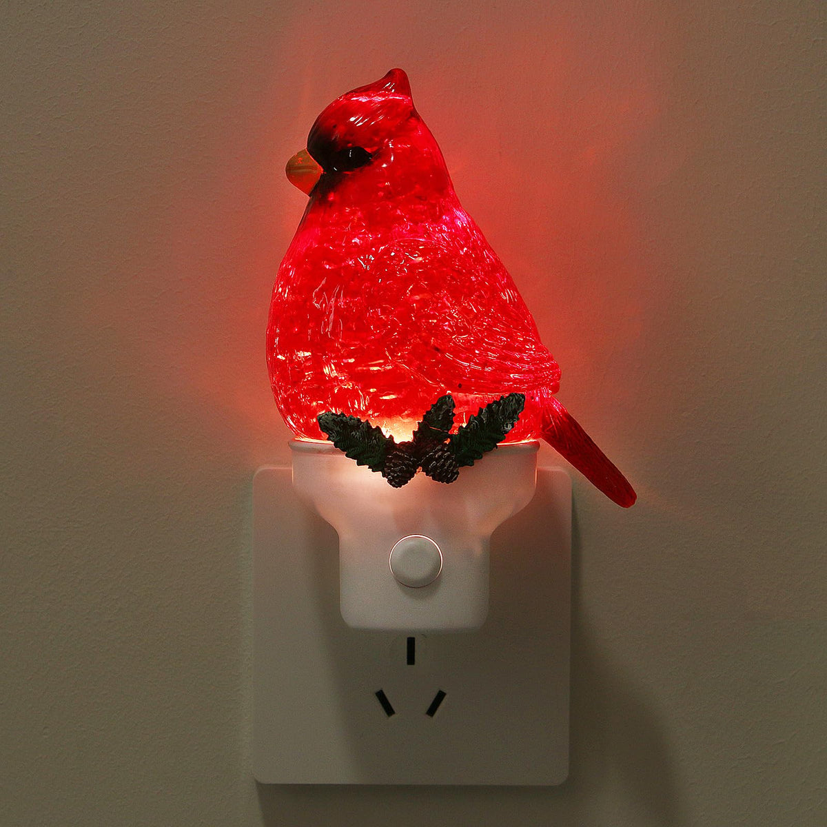 Xanqinluma Christmas Cardinal night light plugged into wall for gentle hallway illumination.