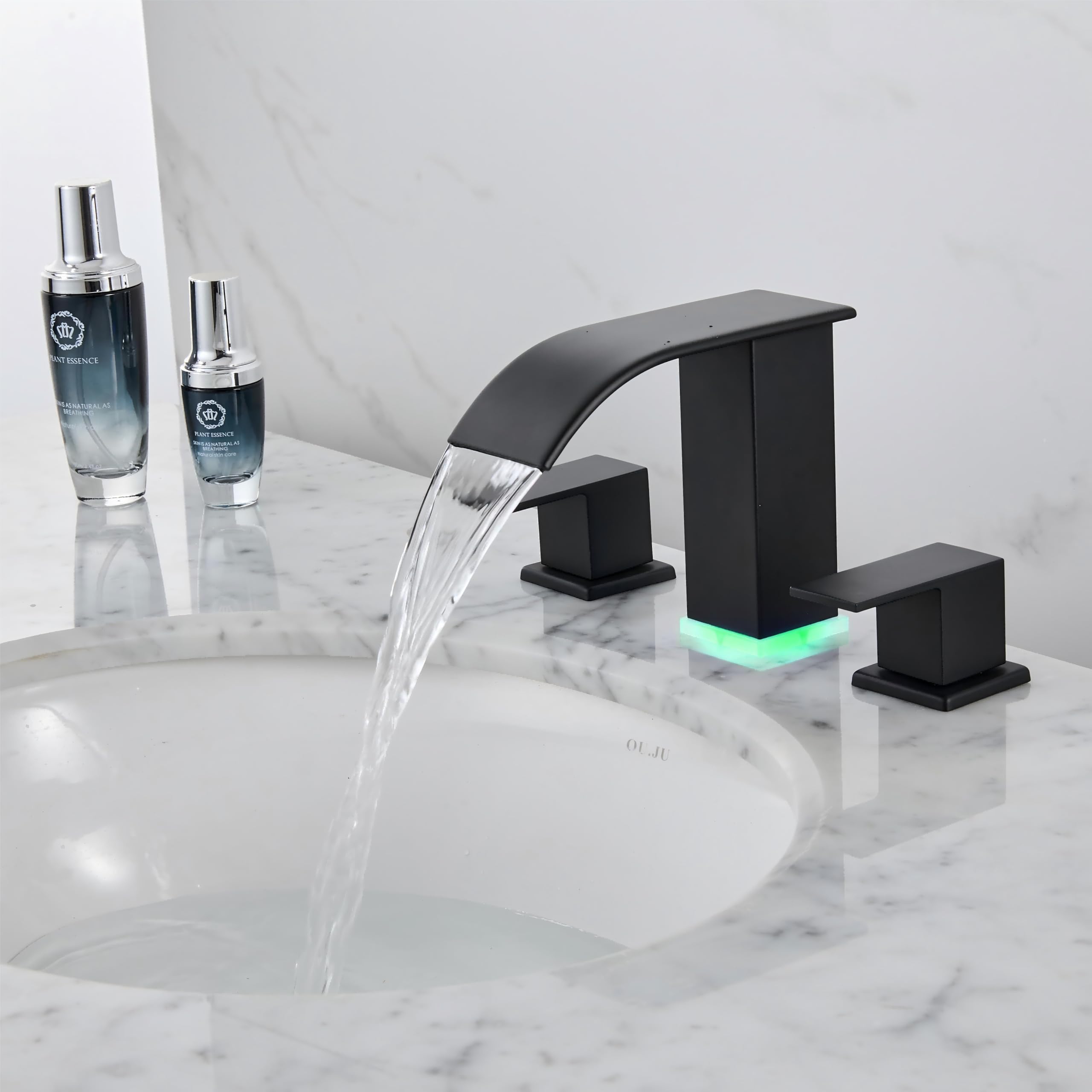 Xiangnaier side profile of widespread vanity faucet in matte black.