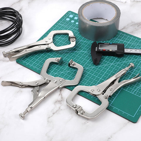 Xosjska C-clamps on a workbench demonstrate secure, repeatable holding.