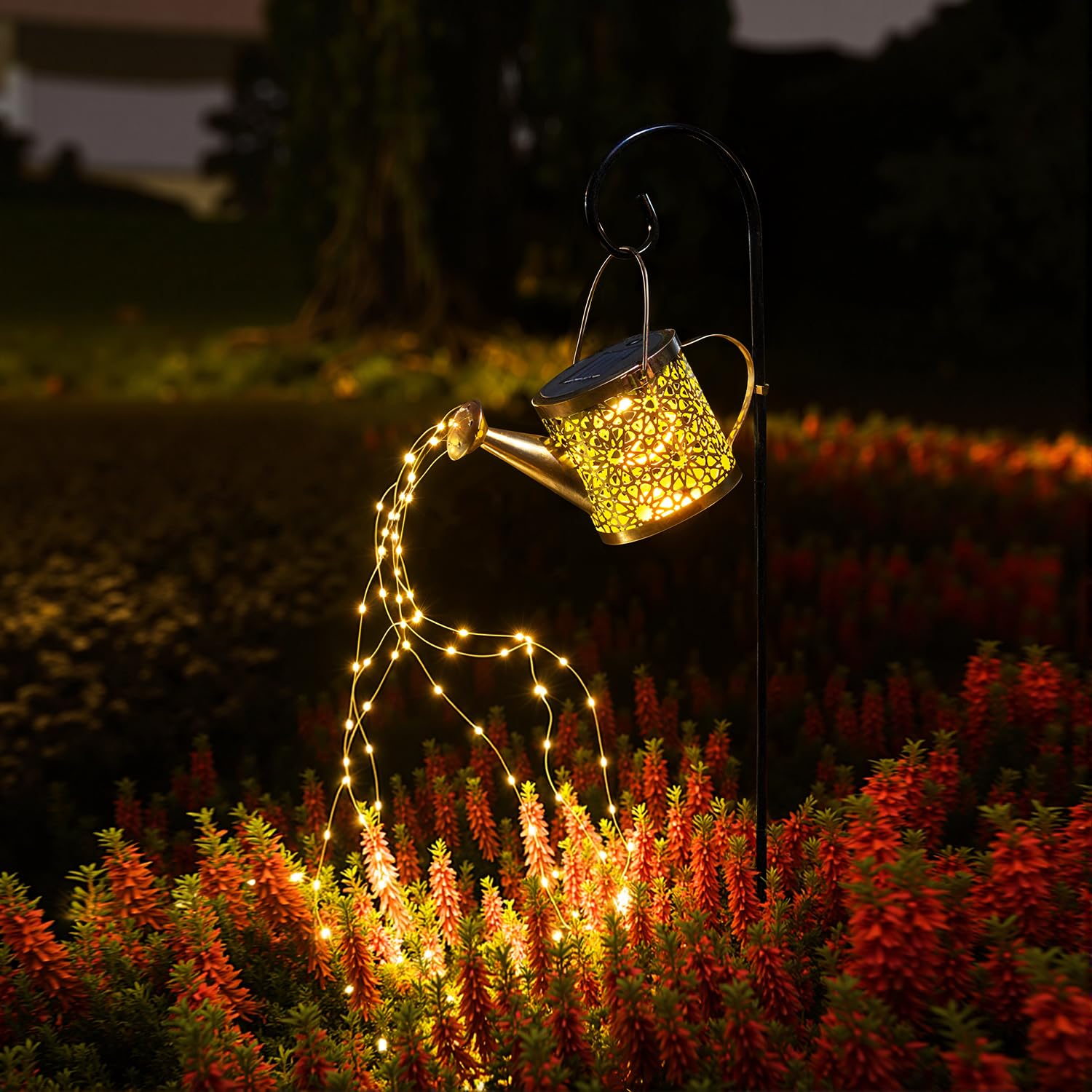 X-PREK solar watering-can lights illuminate garden beds with a graceful water-flow glow