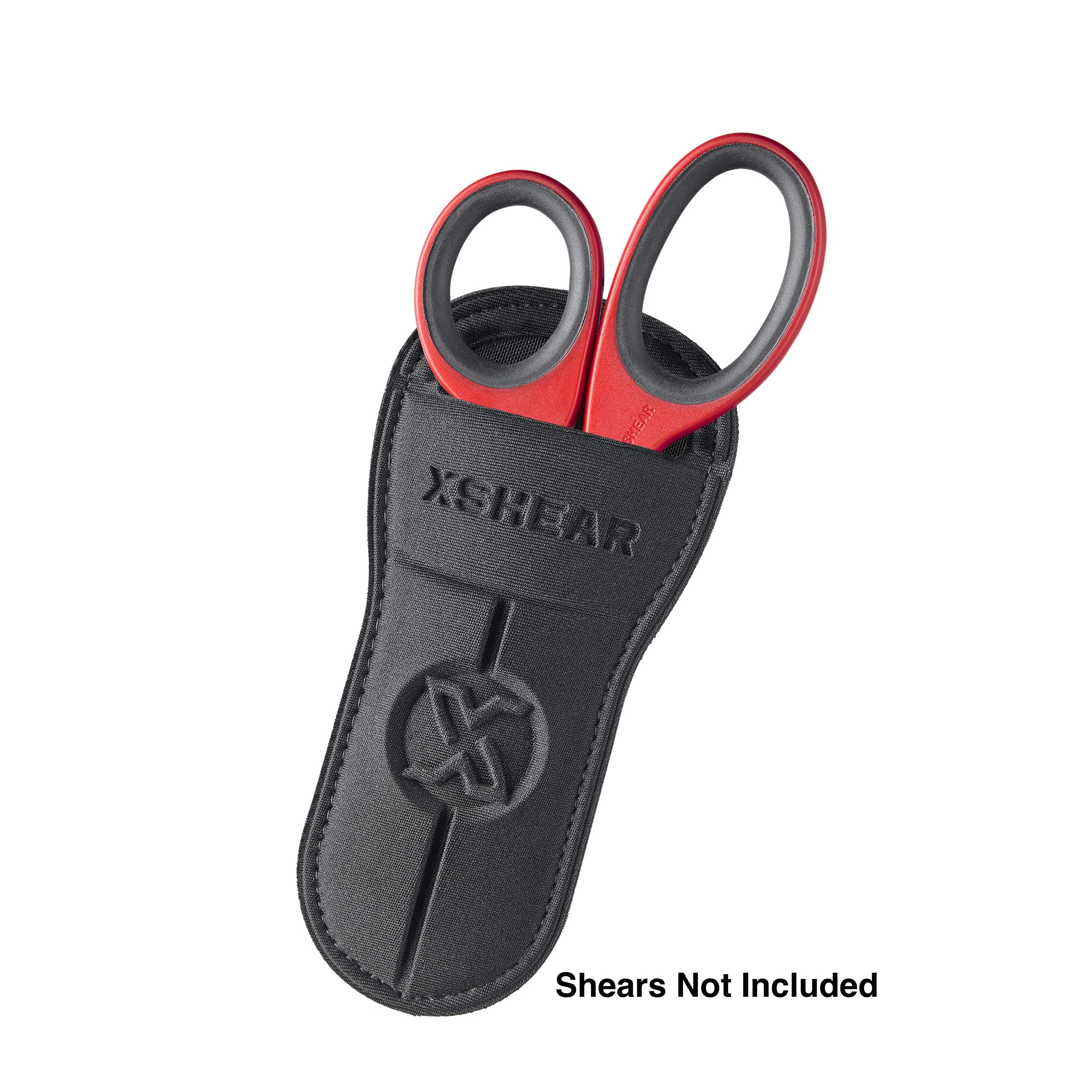 XShear holster worn inside or outside pockets for flexible placement during care.
