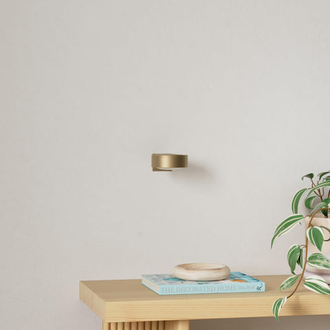 Closeup of Xuolder battery-operated picture light showing compact, easy-to-install design