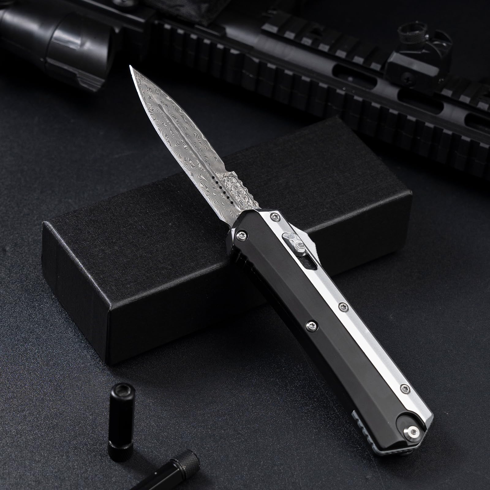 XXV Damascus pocket knife with ergonomic handle for comfortable grip