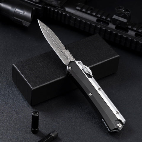 XXV Damascus pocket knife with ergonomic handle for comfortable grip