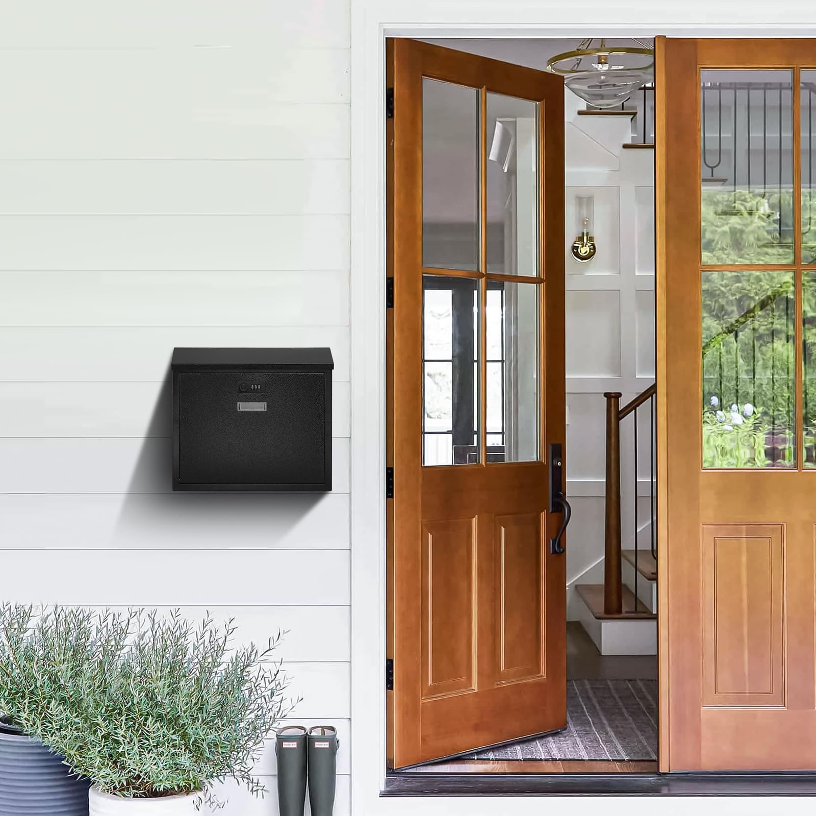Xydled black finish mailbox complements a modern home exterior