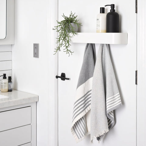 Xympo versatile hanger for coats, jackets, purses, and keys.