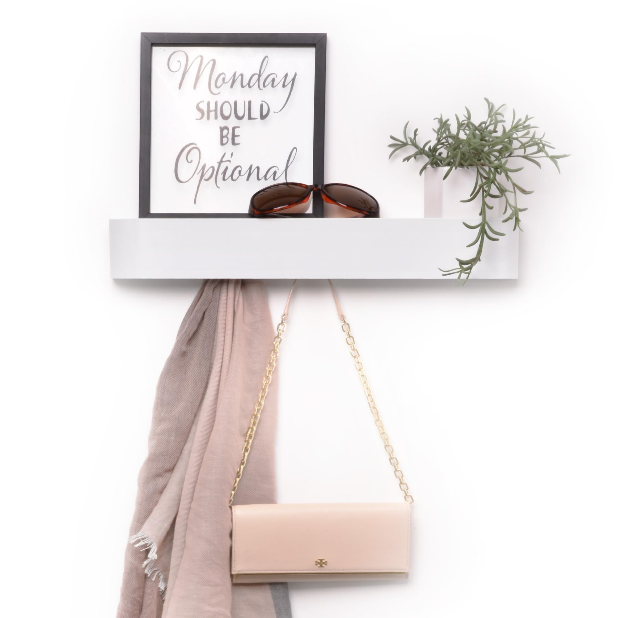 Xympo modern wall-mounted coat rack demonstrates clean lines for a clutter-free entryway.