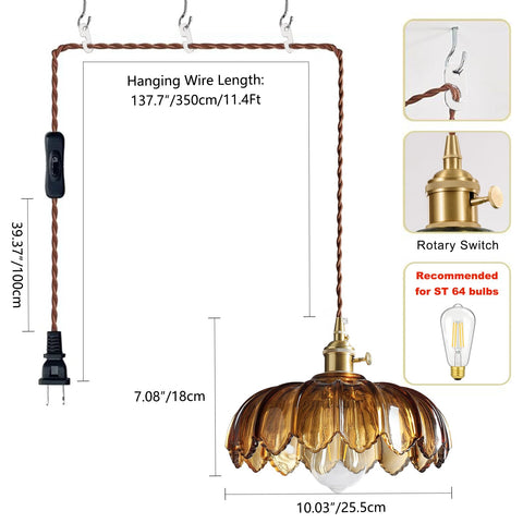 XZHGCEE amber glass pendant ambient light over the dining table.