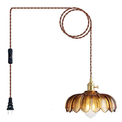 XZHGCEE amber glass pendant shade creates a warm dining atmosphere.
