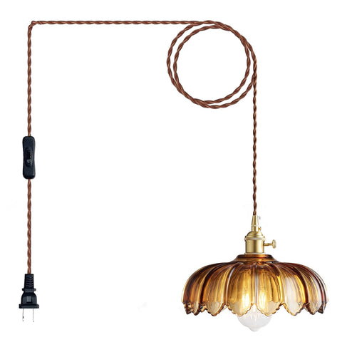 XZHGCEE amber glass pendant shade creates a warm dining atmosphere.