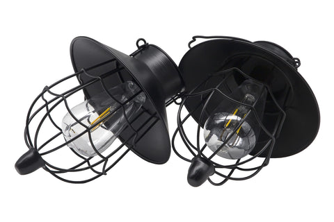 YAKii outdoor lantern shows warm white light along a garden path.