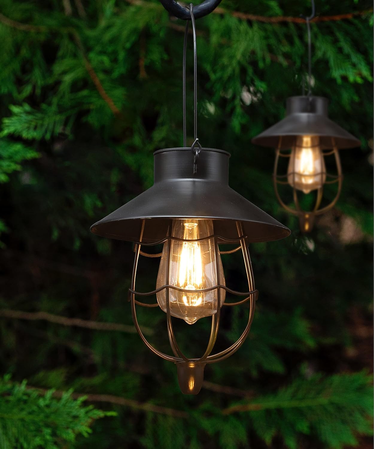 YAKii solar lantern hanging black finish provides warm ambient lighting for outdoor spaces.
