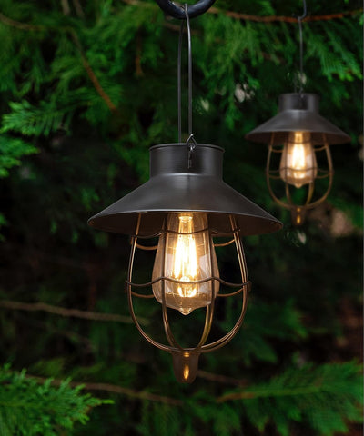 YAKii solar lantern hanging black finish provides warm ambient lighting for outdoor spaces.