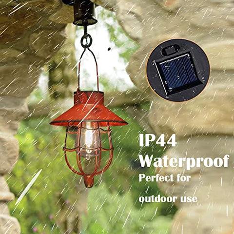 YAKii lantern illuminating a patio and pathway