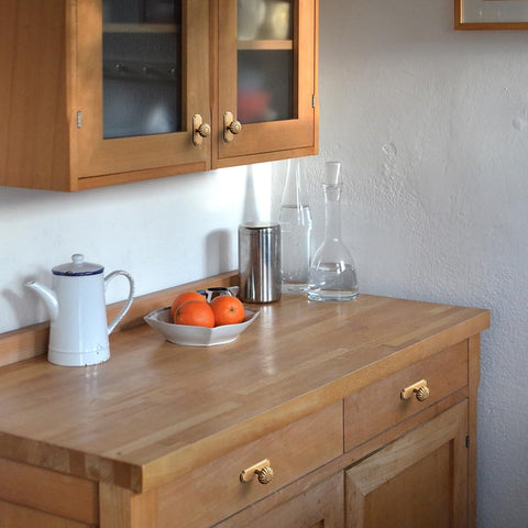 Yanxia set of six knobs displayed on a drawer front for cohesive styling.