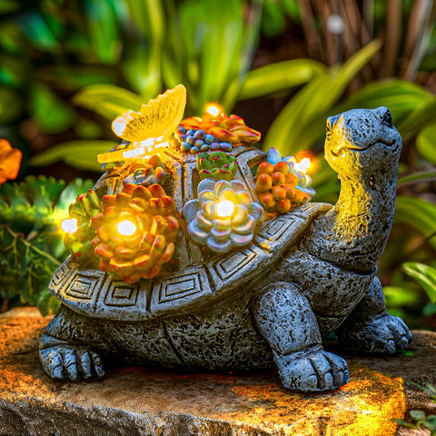 YDKOJGW solar garden turtle with succulents lights brightens outdoor spaces.