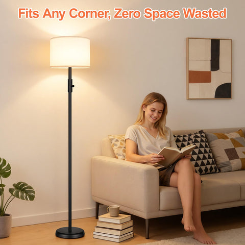 Yemela living room lamp creates warm, focused reading light.