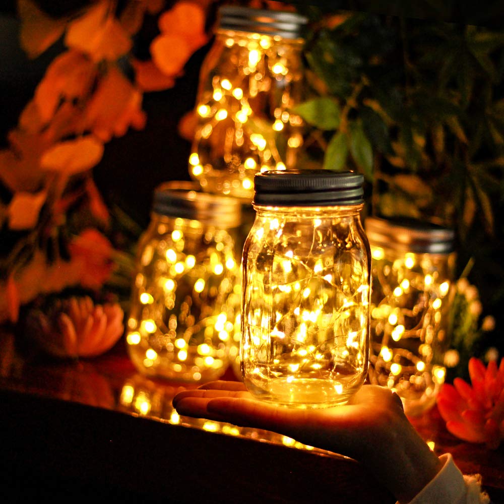 yeuago outdoor lights on mason jar lids at dusk