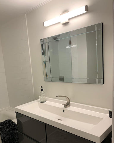 YHTlaeh makeup vanity lighting over mirror for precise grooming tasks.