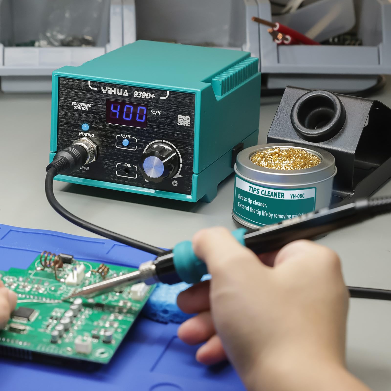 Soldering station with integrated power plug for convenience.