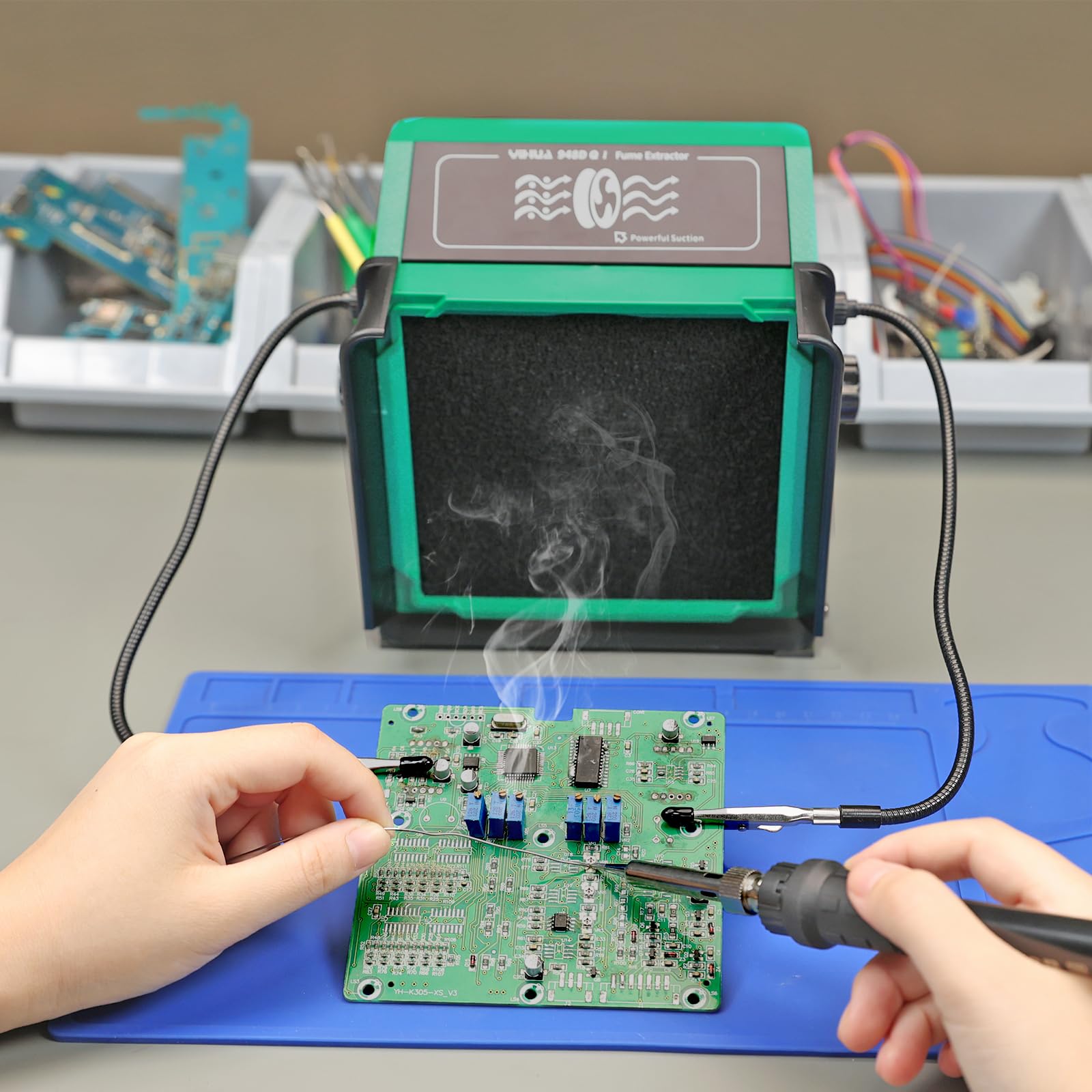Compact workspace setup with the YIHUA device ready for use