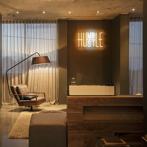 YIKBIK Hustle neon sign with adjustable brightness for tailored ambience.